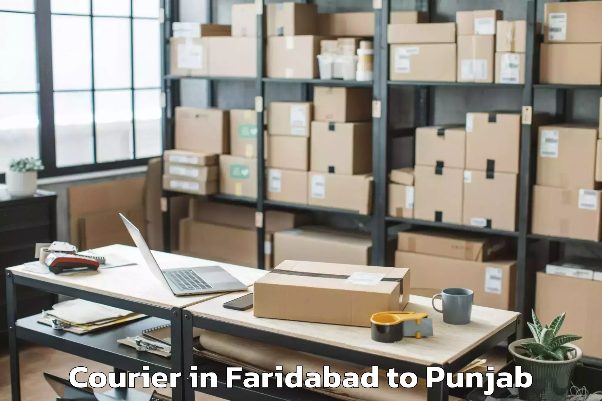 Top Faridabad to Fatehgarh Churian Courier Available